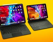 Image result for White vs Black Magic Keyboard iPad Pro