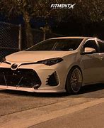 Image result for Toyota Corolla 2018 SE Customized Black and Pink