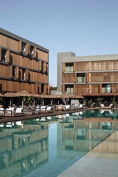 New To Ibiza - OKU Ibiza - The Luxury Editor | Hotel architecture, Hotel design architecture, Hotel ibiza