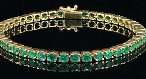 Image result for Gold and Emerald Bracelet