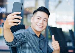 Image result for Someoeone Taking a Selfie