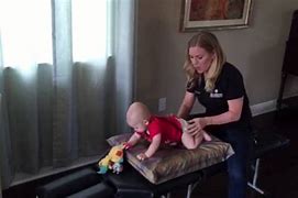 Image result for Chiropractic Baby Adjusting