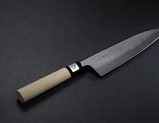 Image result for Yoshihiro VG-10 16 Layer Hammered Damascus Gyuto Knife