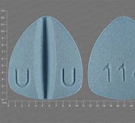 Image result for Blue Triangle Shaped Pill