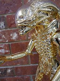 Image result for Alien in Gold Suit