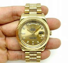 Image result for Rolex Day-Date 18k Gold Watch