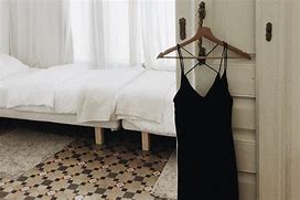 Image result for Black Cocktail Dress On Hanger
