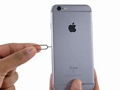 Image result for How to Pull Out Sim Tray iPhone 6s