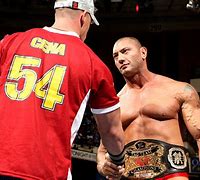 Image result for Batista World Tag Team Champion John Cena