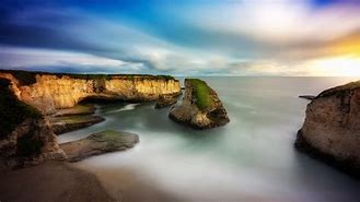 Image result for Sky Clouds Sea Rocks