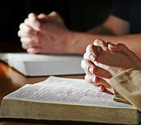 Image result for Believer Praying with Bible