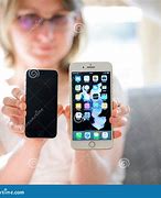 Image result for iPhone SE Size in Hand