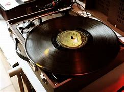 Image result for Vintage Turntable That Was Side Ways
