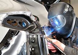 Image result for Two People Welding Car