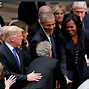 Image result for George W. Bush and Michelle Obama