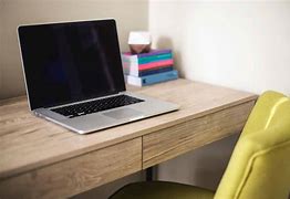 Image result for Apple Notebook On the Table