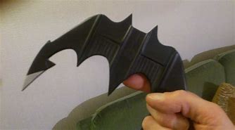 Image result for Batman Weapons Batarang