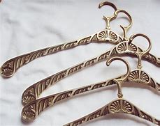 Image result for Fancy Decorative Metal Clothes Hangers