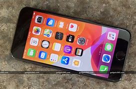 Image result for iPhone 8 Red vs iPhone SE Red