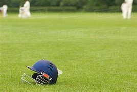 Image result for Cricket Helmet On Ground