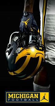 Image result for Michigan Wolverines Plying Football