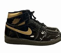 Image result for Black Nike with Gold Swoosh