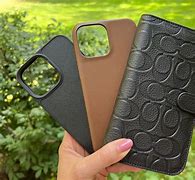 Image result for iPhone 13 Blue with Black Leather Case