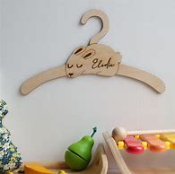 Image result for Wooden Baby Coat Hangers