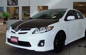 Image result for Toyota Corolla 2010 with Black Roof