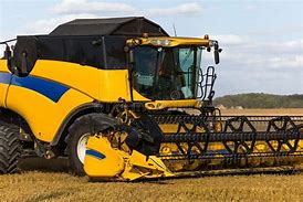Image result for Yellow Combine Harvester
