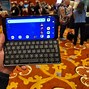 Image result for Small Clamshell Phone with Physical Keyboard