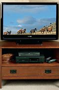 Image result for Flat Screen TV Corner Armoire