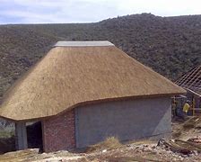 Image result for A Single Post with a Thatch Roof