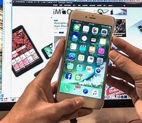 Image result for iPhone SE Hard Reset Button