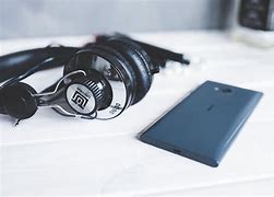 Image result for Headphones in Phone Haus