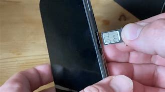 Image result for How to Insert the Sim Card in iPhone 11
