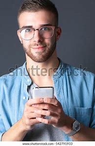 Image result for Person Holding a Phone On a Bed