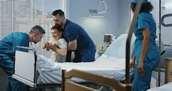 Image result for Doctor Lifting Patient