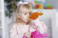Image result for Little Girl Drinking Juice