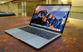 Image result for Spacee Gray MacBook vs Sliver