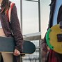 Image result for How to Hold Skateboard On Bag