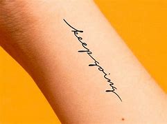Image result for Heartless Word Tattoo