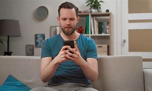 Image result for Person Holding a Phone