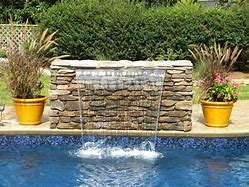Image result for Waterfall into Swimming Pool