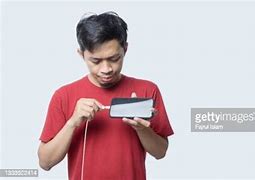 Image result for Asia Man Charging Phone