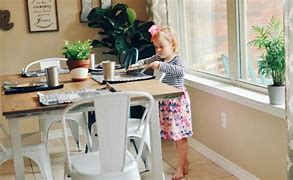 Image result for Child Laying On Table