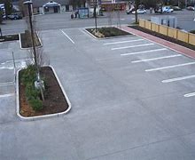 Image result for Concrete Car Stops Parking Lot