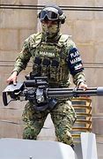 Image result for Guy with Minigun