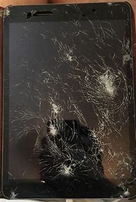 Image result for A Broken Screen iPad into Pieces