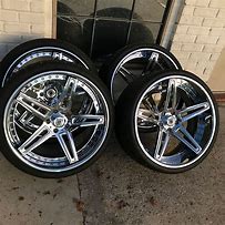 Image result for 22 Inch Staggered Chrome Rims